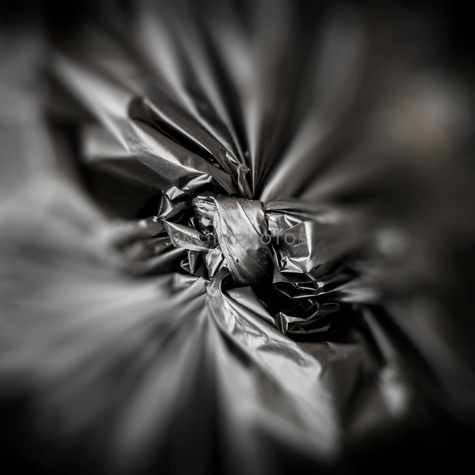 Blurry black garbage bag by germanopoli