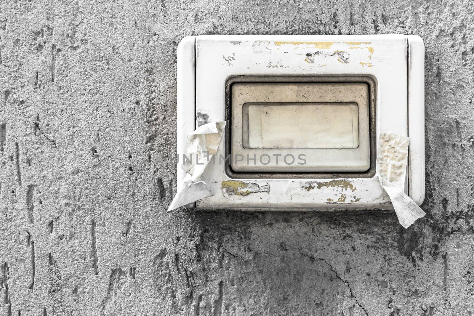 Old plastic white doorbell button and nameplate