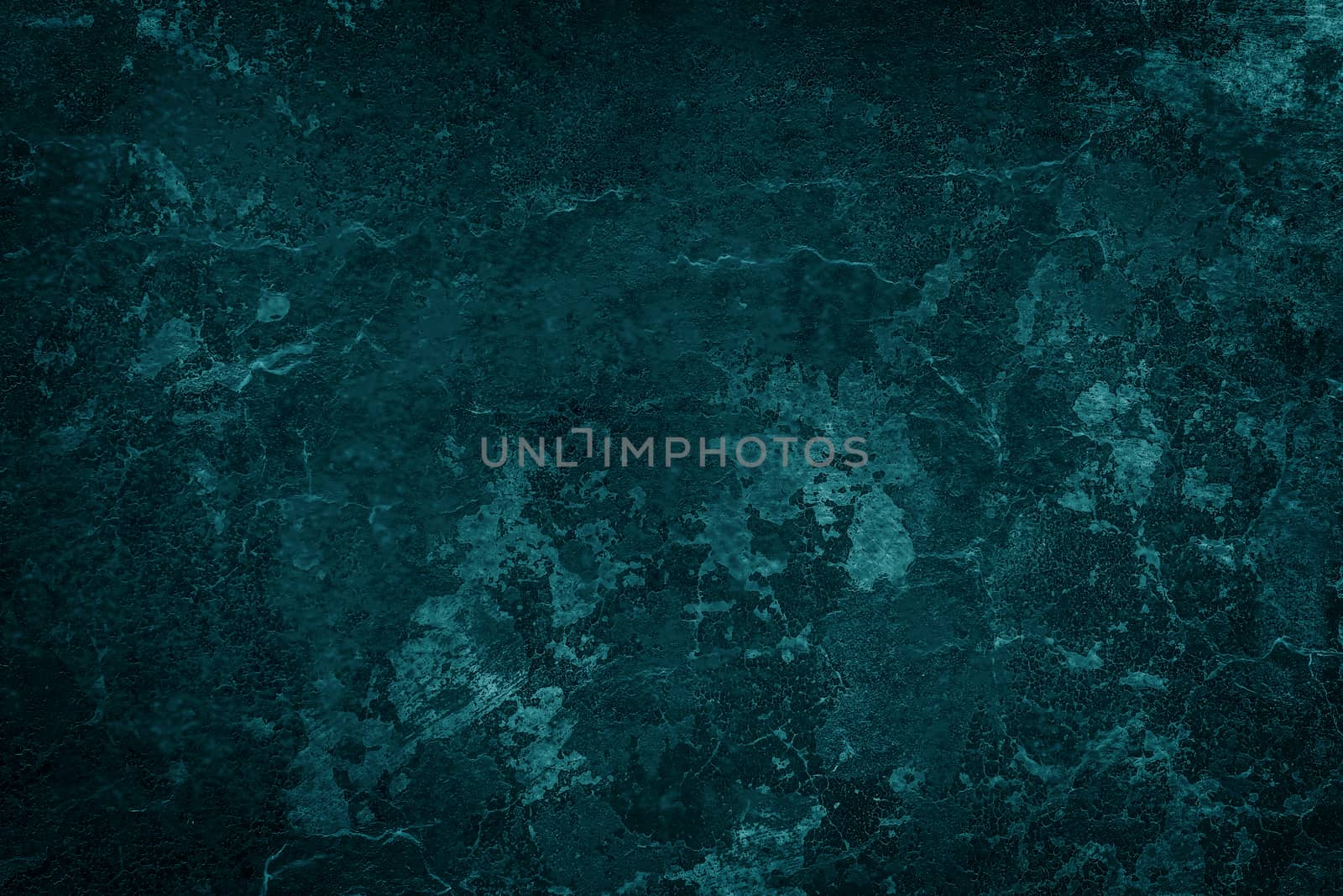 Texture, background of dark surface of blue mineral, wall or ice at close range