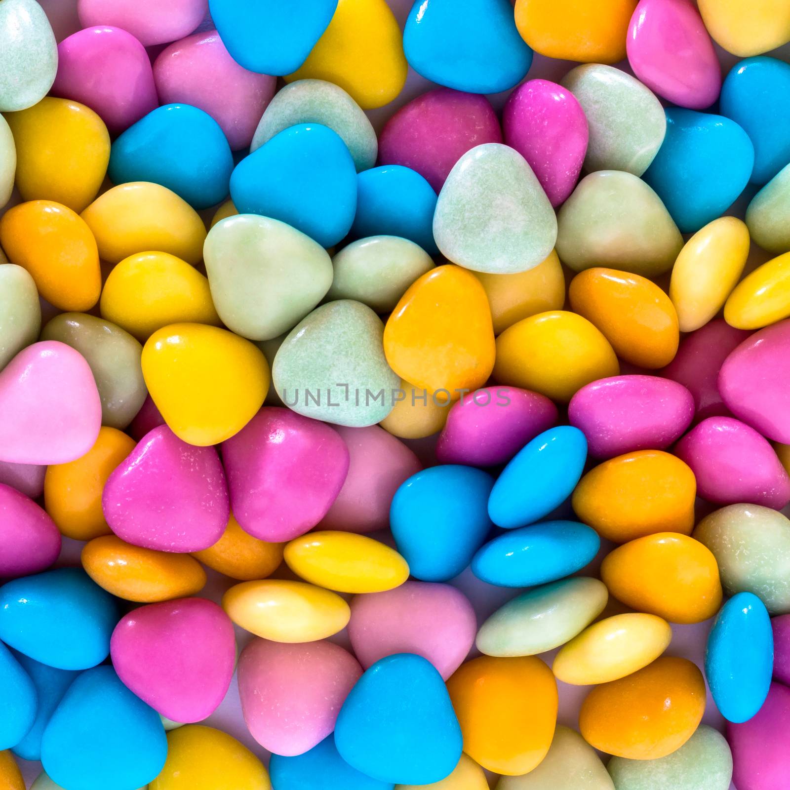 Pile of colorful candy of chocolate with top view