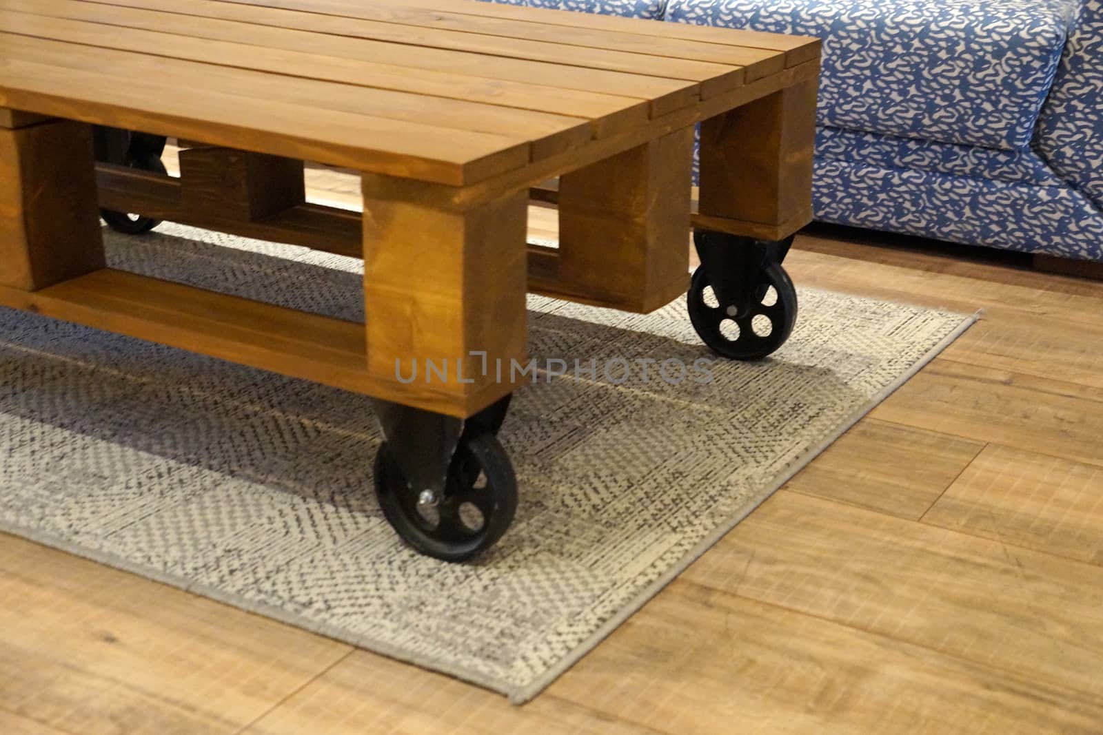 coffee table on wheels made from a wooden pallet.