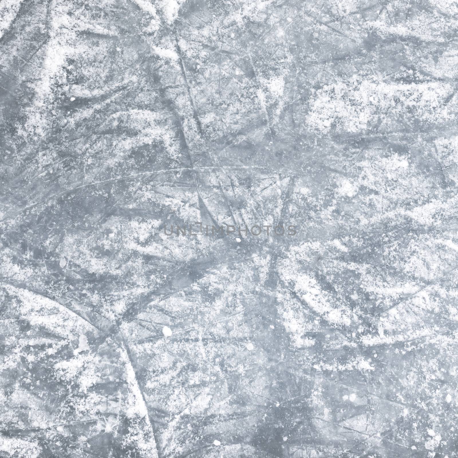 Ice background with marks from skating and hockey