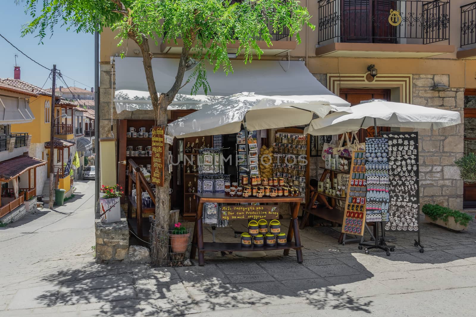 Day summer view of local gift shops without customers at Athytos village, Kassandra peninsula.