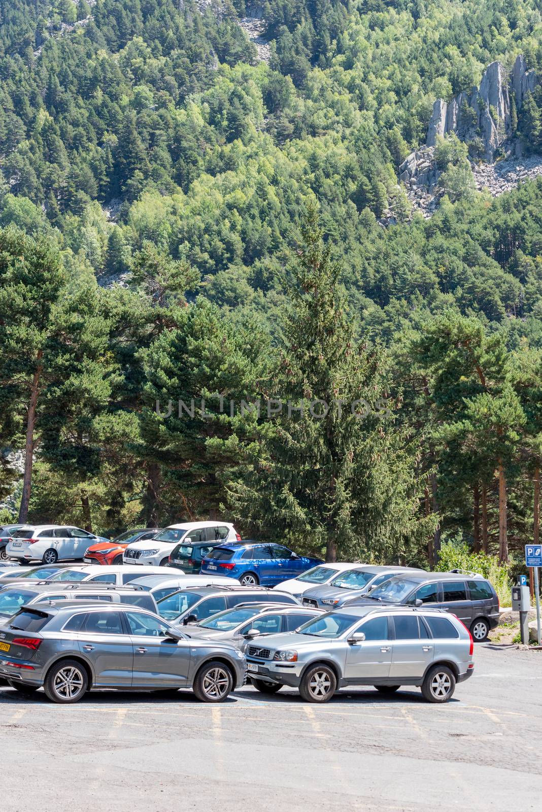 Escaldes Engodany, Andorra : 20 August 2020 : Cars parked in the Engolasters lake parking in Escaldes Engordany, Andorra in summer 2020