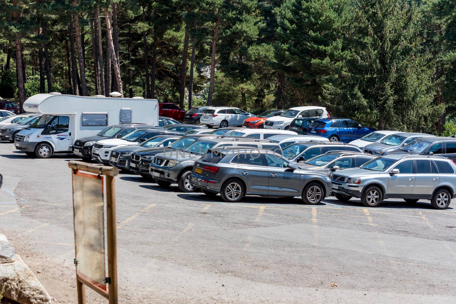 Escaldes Engodany, Andorra : 20 August 2020 : Cars parked in the Engolasters lake parking in Escaldes Engordany, Andorra in summer 2020