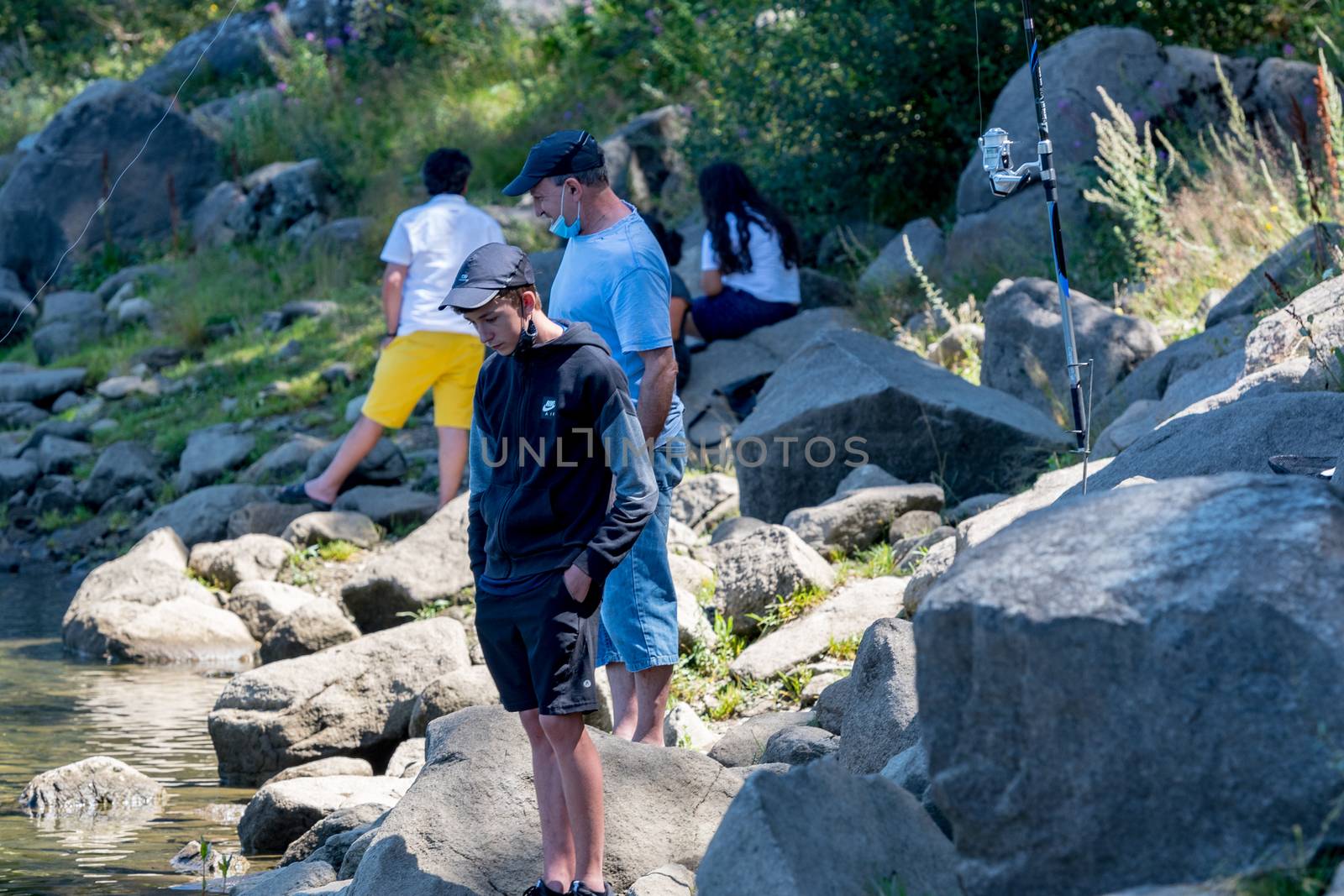 Escaldes Engodany, Andorra : 20 August 2020 : Tourists enjoying the Summer Afternoon at Lake Engolasters in the Pyrenees. Escaldes Engordany, Andorra in summer 2020
