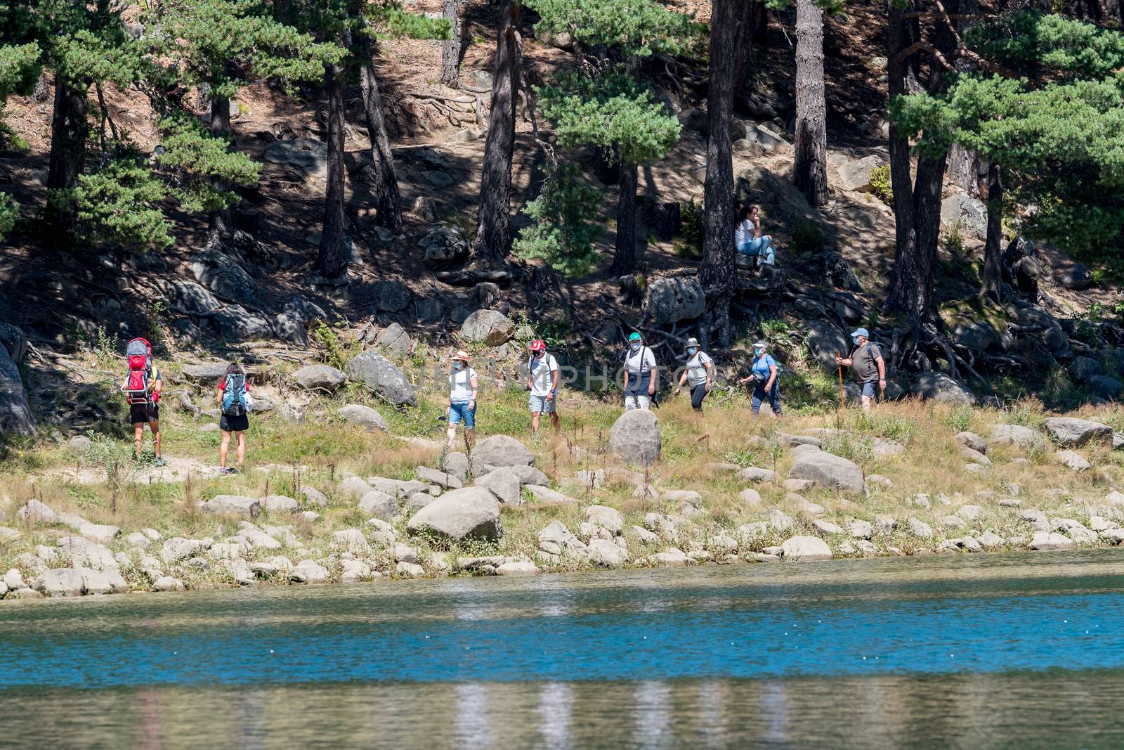 Escaldes Engodany, Andorra : 20 August 2020 : Tourists enjoying the Summer Afternoon at Lake Engolasters in the Pyrenees. Escaldes Engordany, Andorra in summer 2020