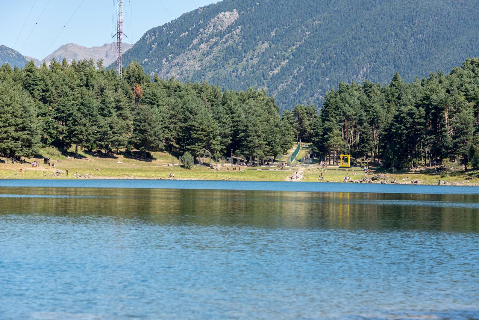 Escaldes Engodany, Andorra : 20 August 2020 : Tourists enjoying the Summer Afternoon at Lake Engolasters in the Pyrenees. Escaldes Engordany, Andorra in summer 2020