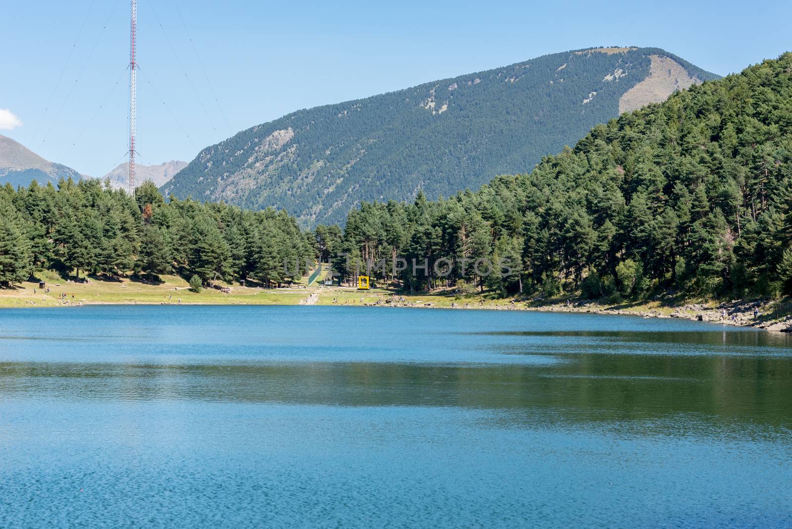 Summer afternoon at Lake Engolasters in the Pyrenees. Escaldes Engordany, Andorra.