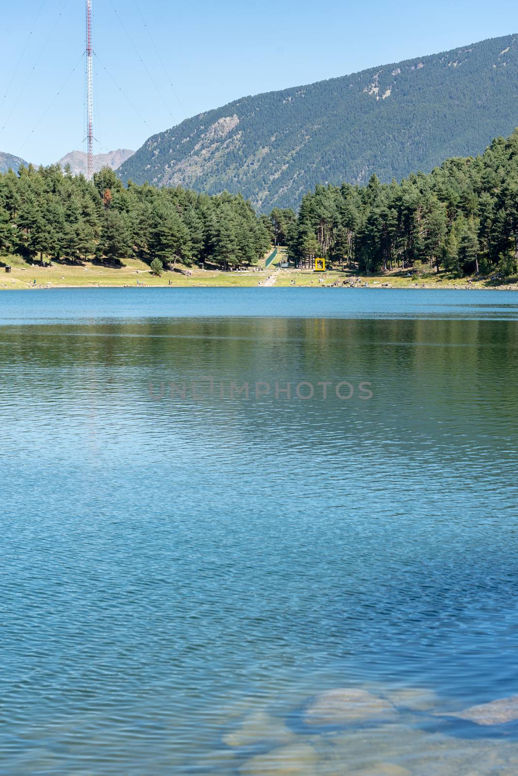 Summer afternoon at Lake Engolasters in the Pyrenees. Escaldes Engordany, Andorra.