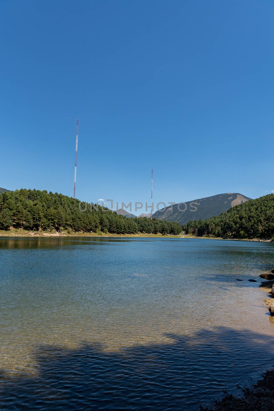 Summer afternoon at Lake Engolasters in the Pyrenees. Escaldes Engordany, Andorra.