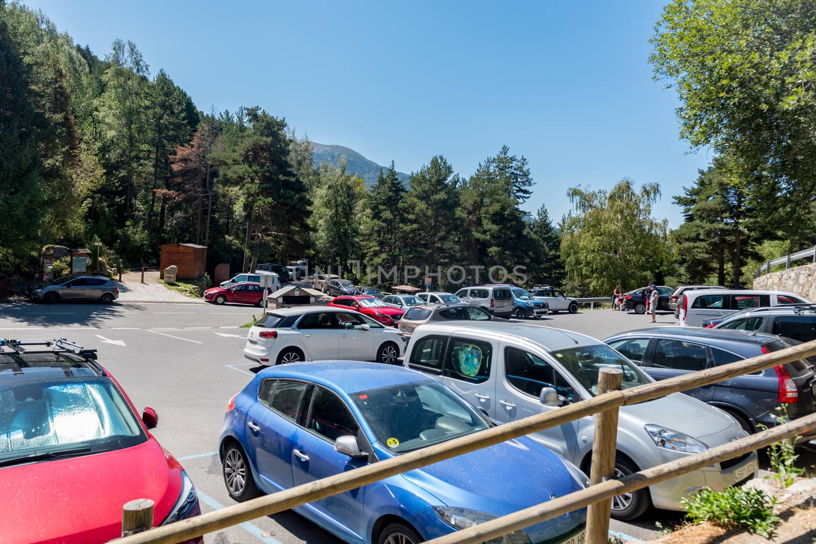 Escaldes Engodany, Andorra : 20 August 2020 : Cars parked in the Engolasters lake parking in Escaldes Engordany, Andorra in summer 2020