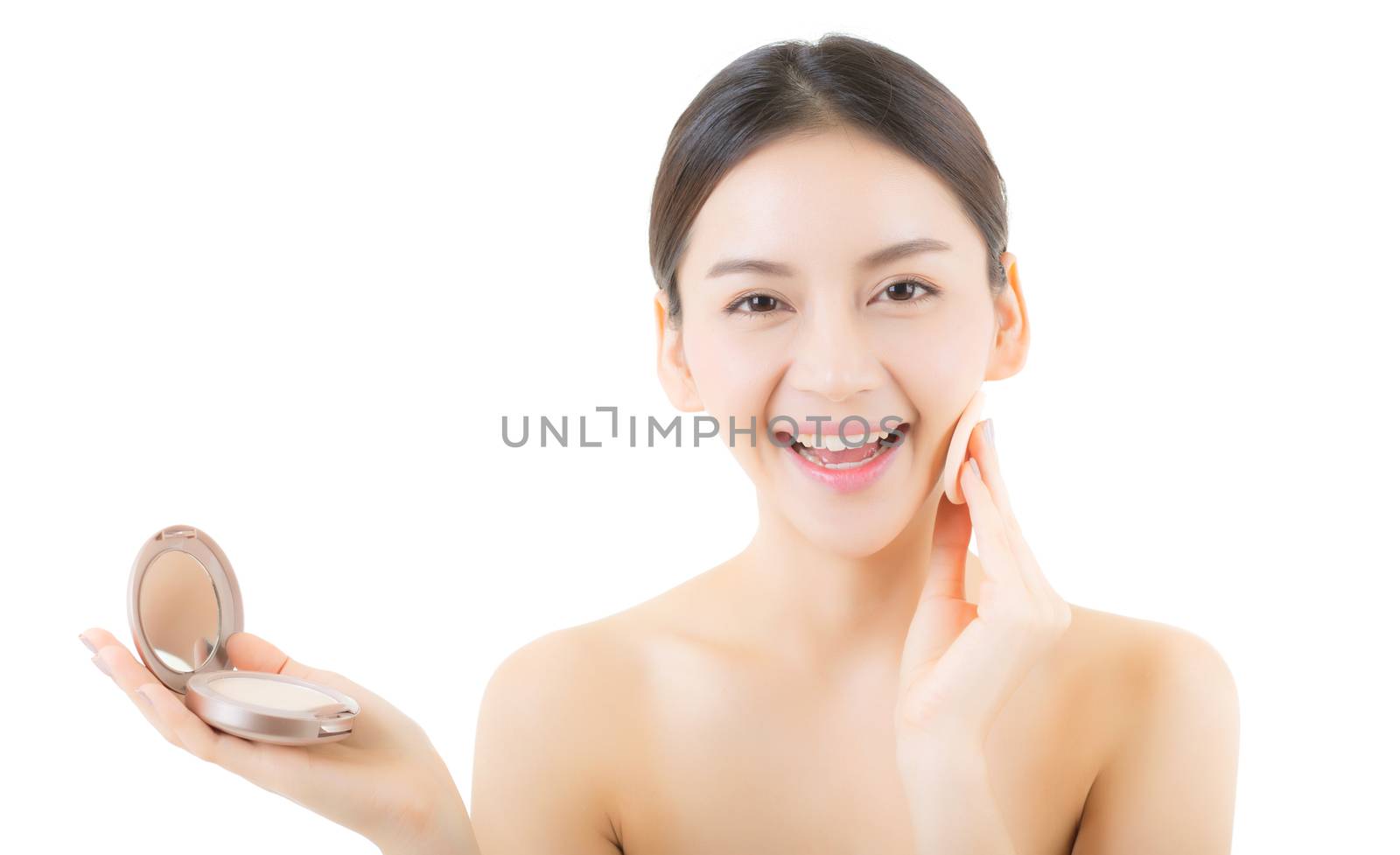 Asian woman beauty applying powder puff at cheek, cosmetics beautiful concept.