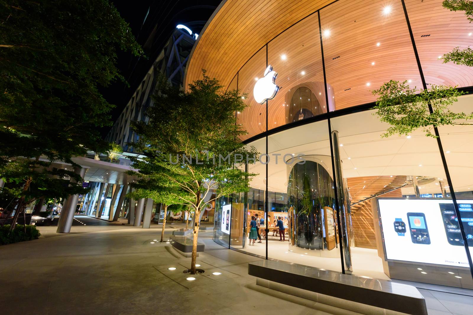 apple store shop front side of the central world shopping center Thailand by rukawajung