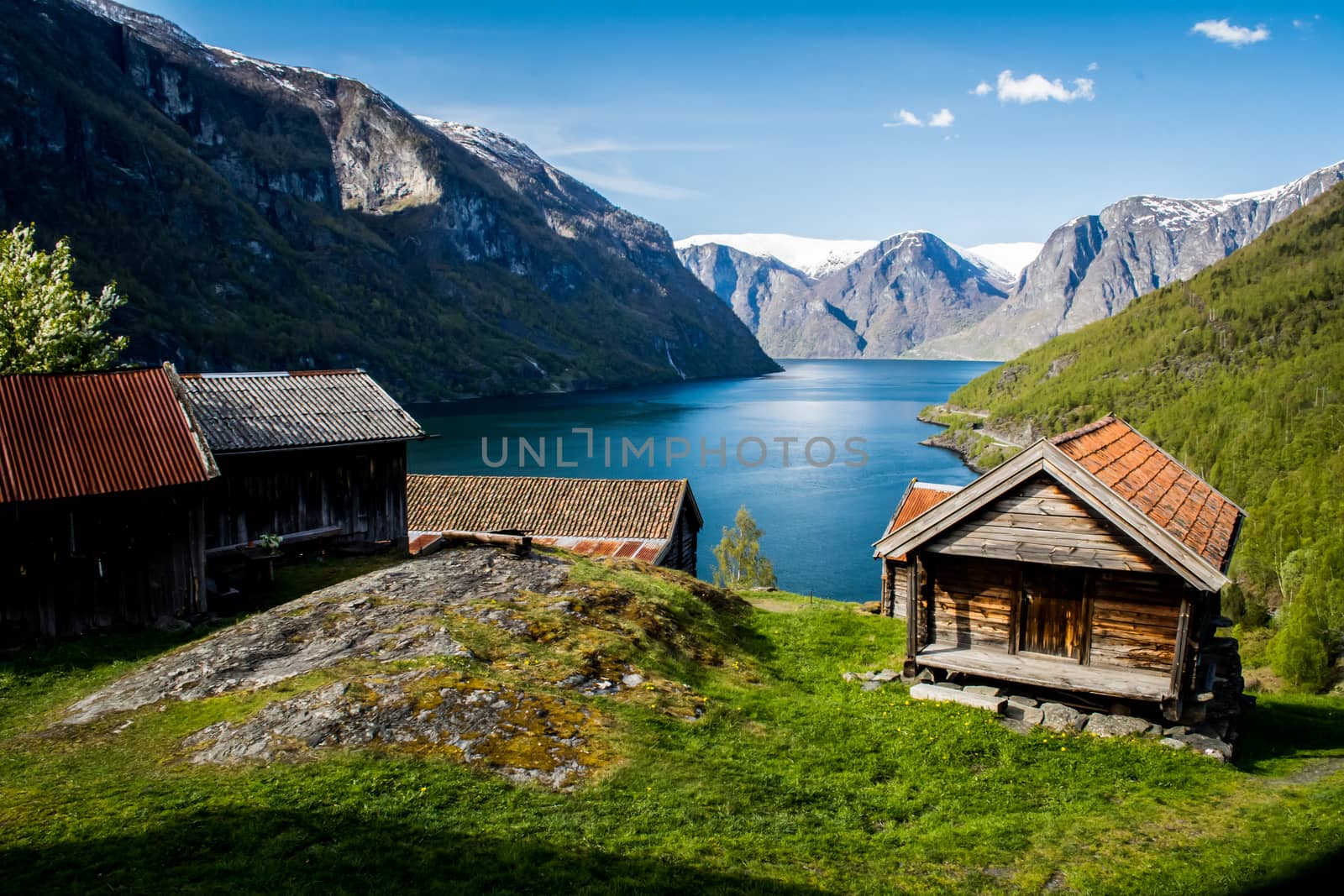 Otternes, Norway, may 2014: view on the old historical village with wooden houses and aurlandsfjord fjord view