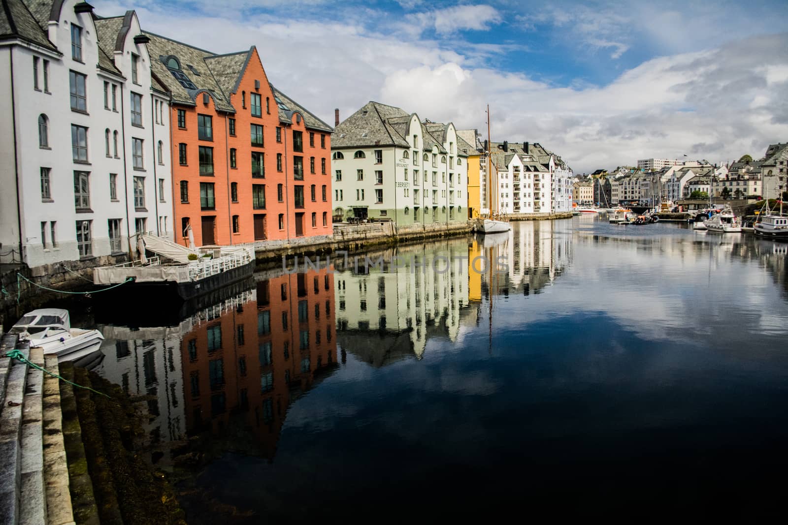 Alesund, Norway, May 2015: historical houses on the canal of the city