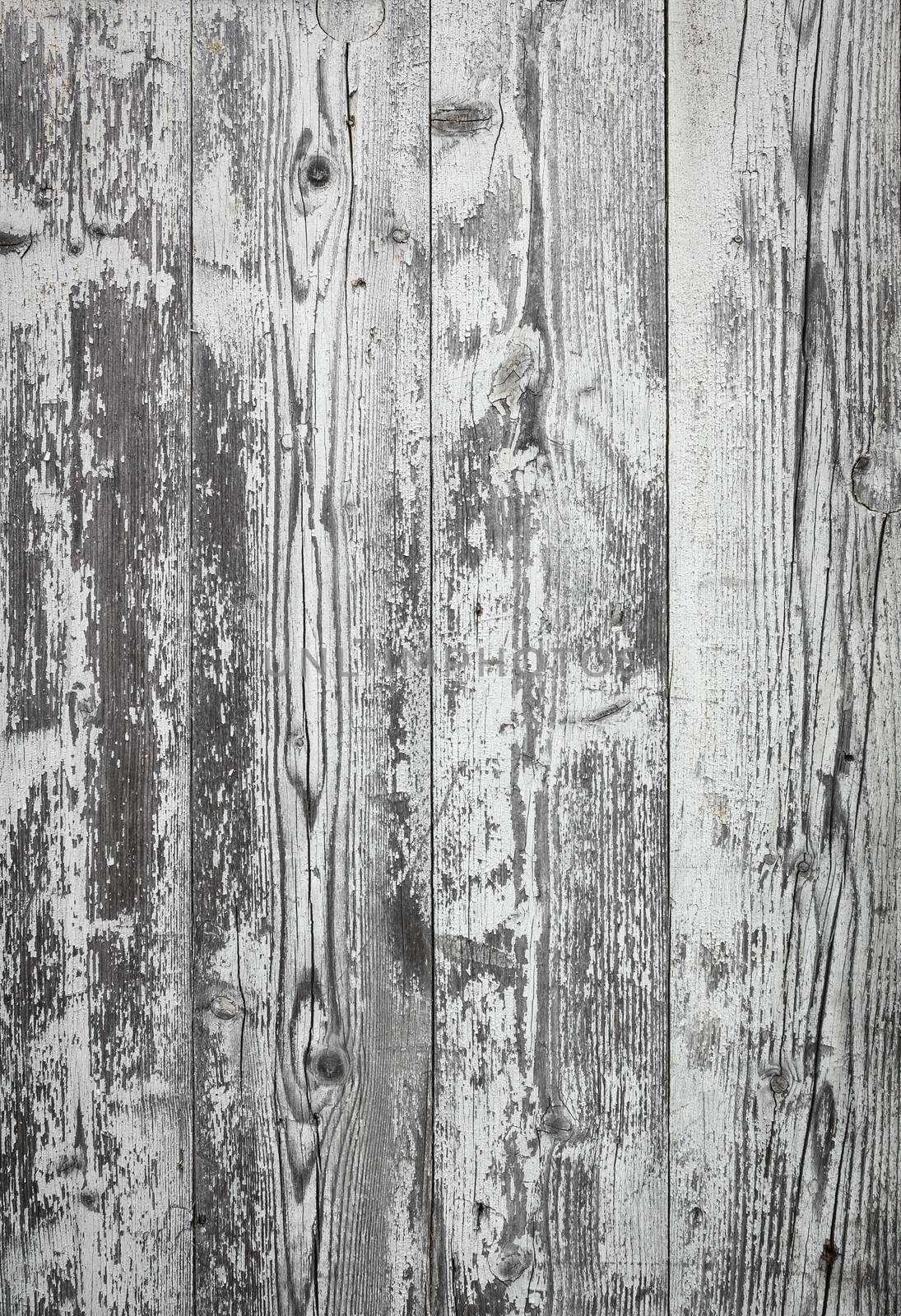 Rustic wooden planks background with peeling white paint