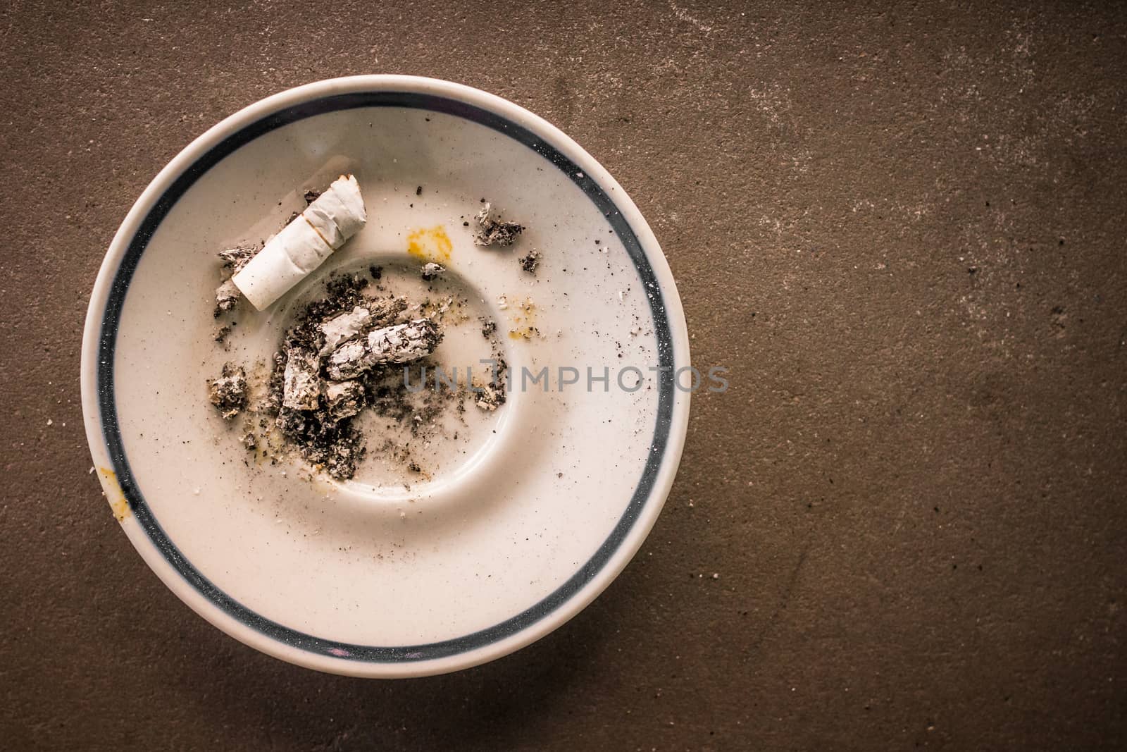 A saucer used as ashtrays.