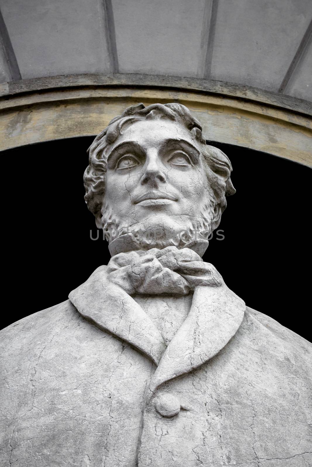 A marble bust in memory of an Italian writer and musician.
