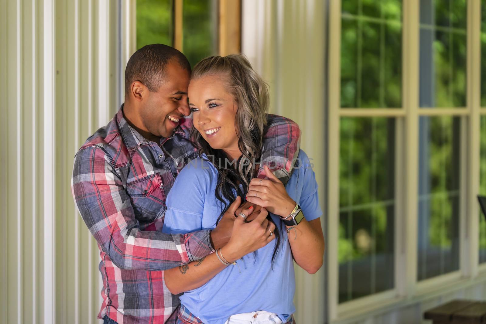 A Beautiful Interracatial Couple Enjoying Each Others Company by actionsports