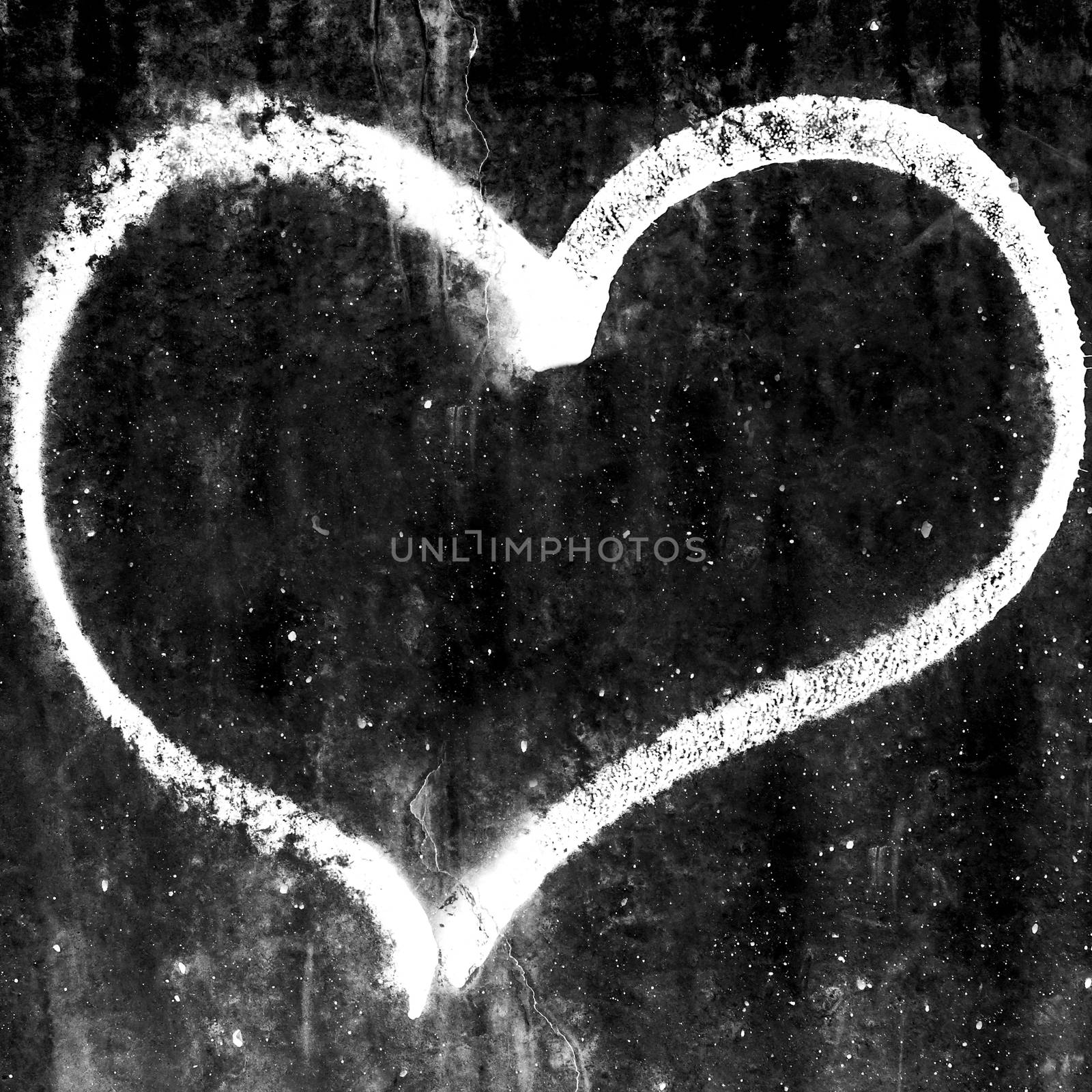 Heart painted on grunge and dark background, love concept.