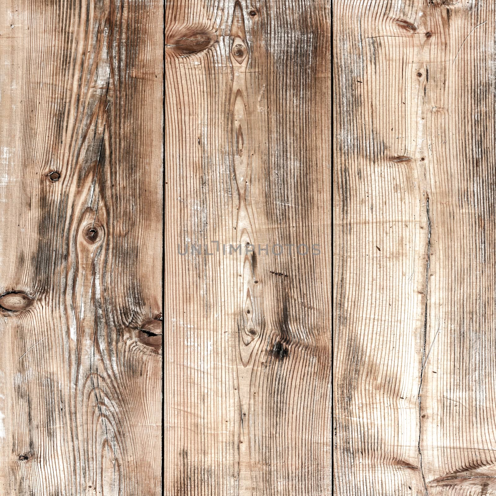 Close-up of the three old wooden boards vertically arranged