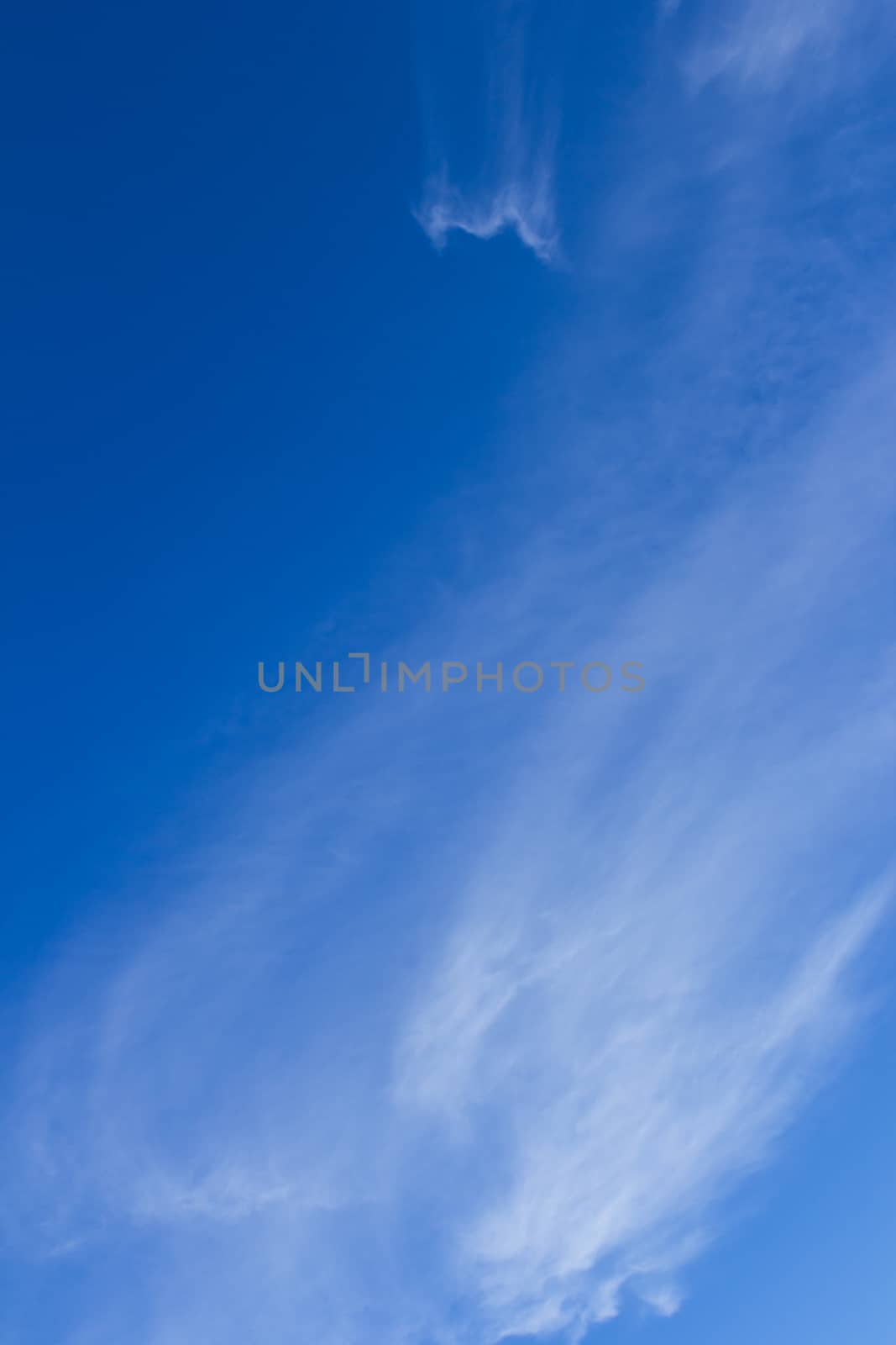White fluffy clouds in the blue sky