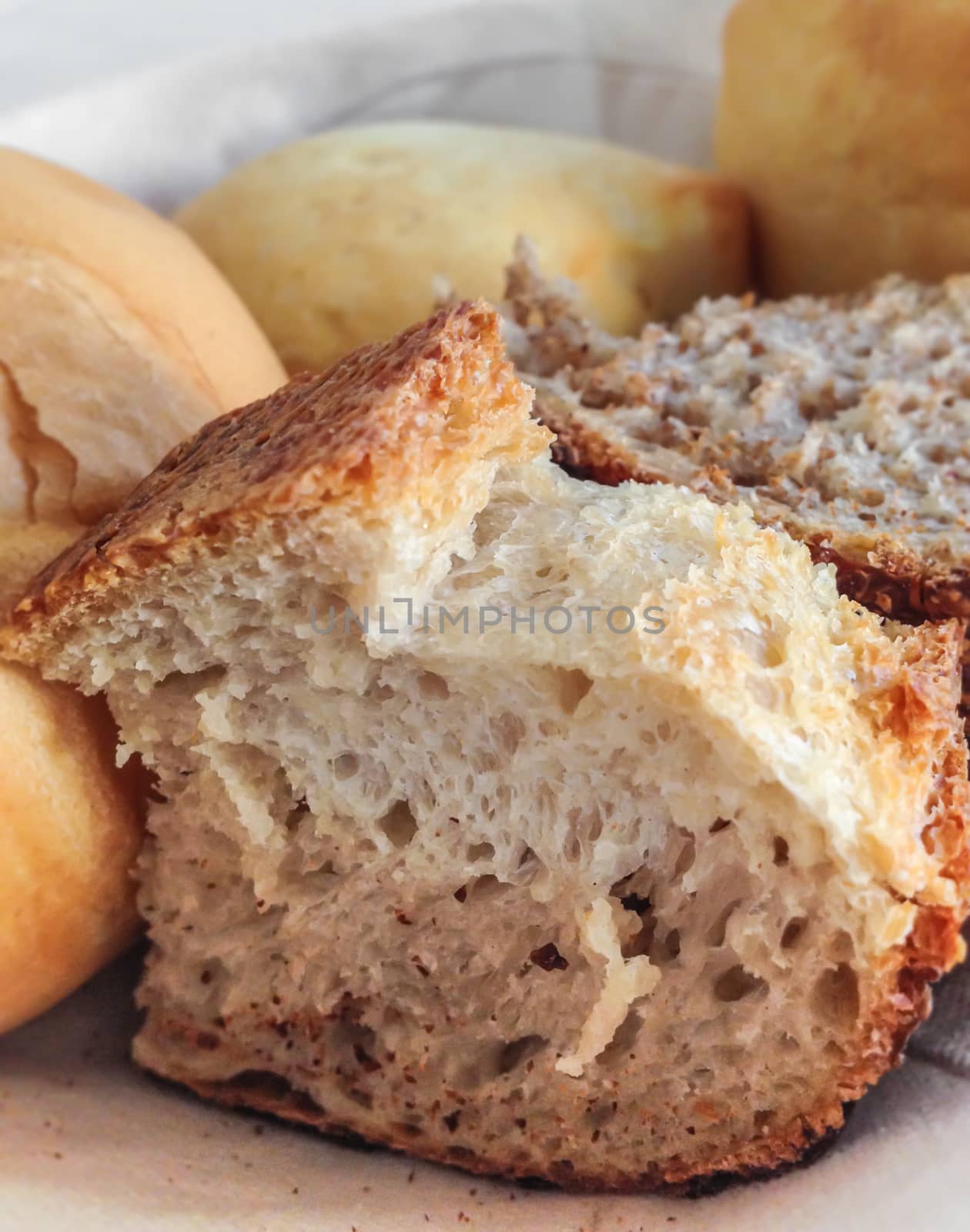 Close-up of traditional bread. Rustic, homemade, fresh wholegrain bread. Shallow depth of field.