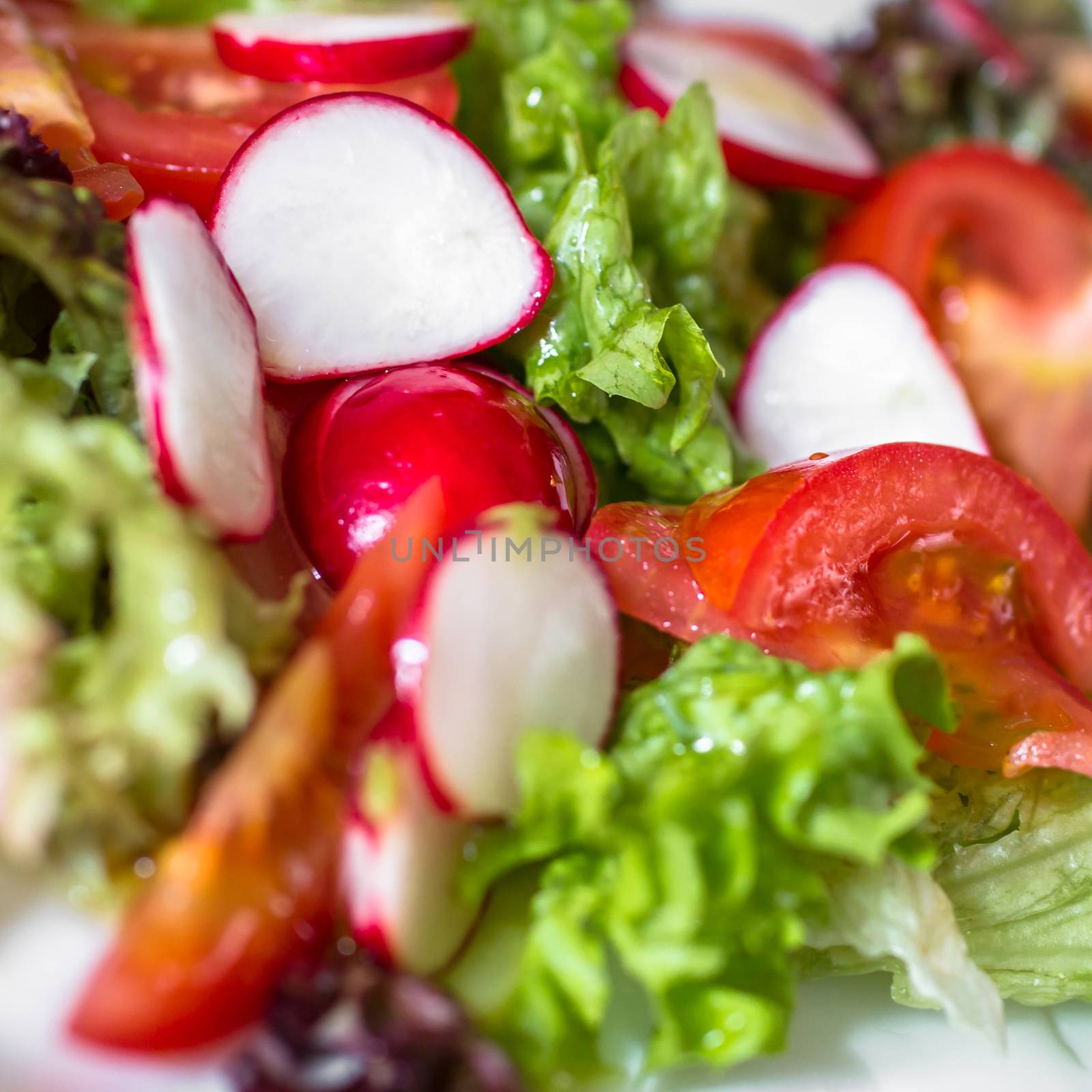 Close up of a salad of seasonal vegetables.
