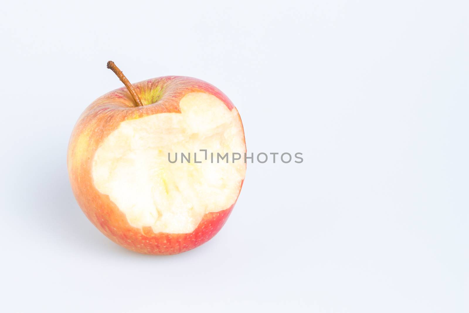 Red Delicious Apple on White Background. Bitten apple.
