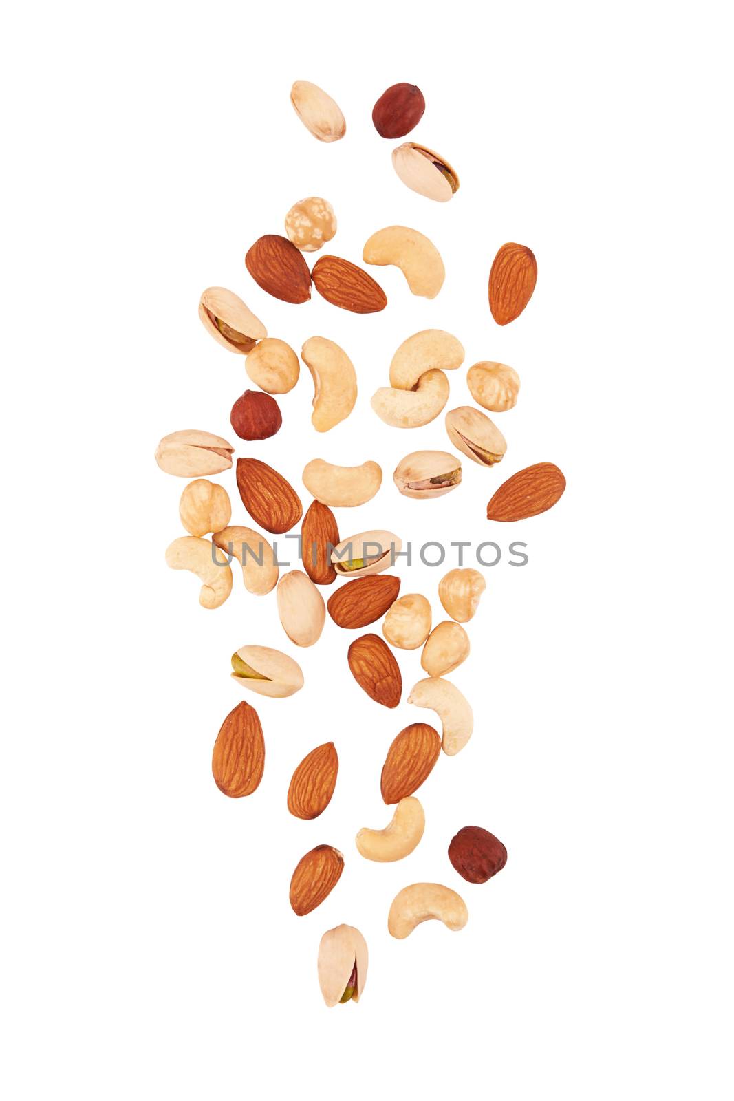 Heap of mixed nuts isolated on white background