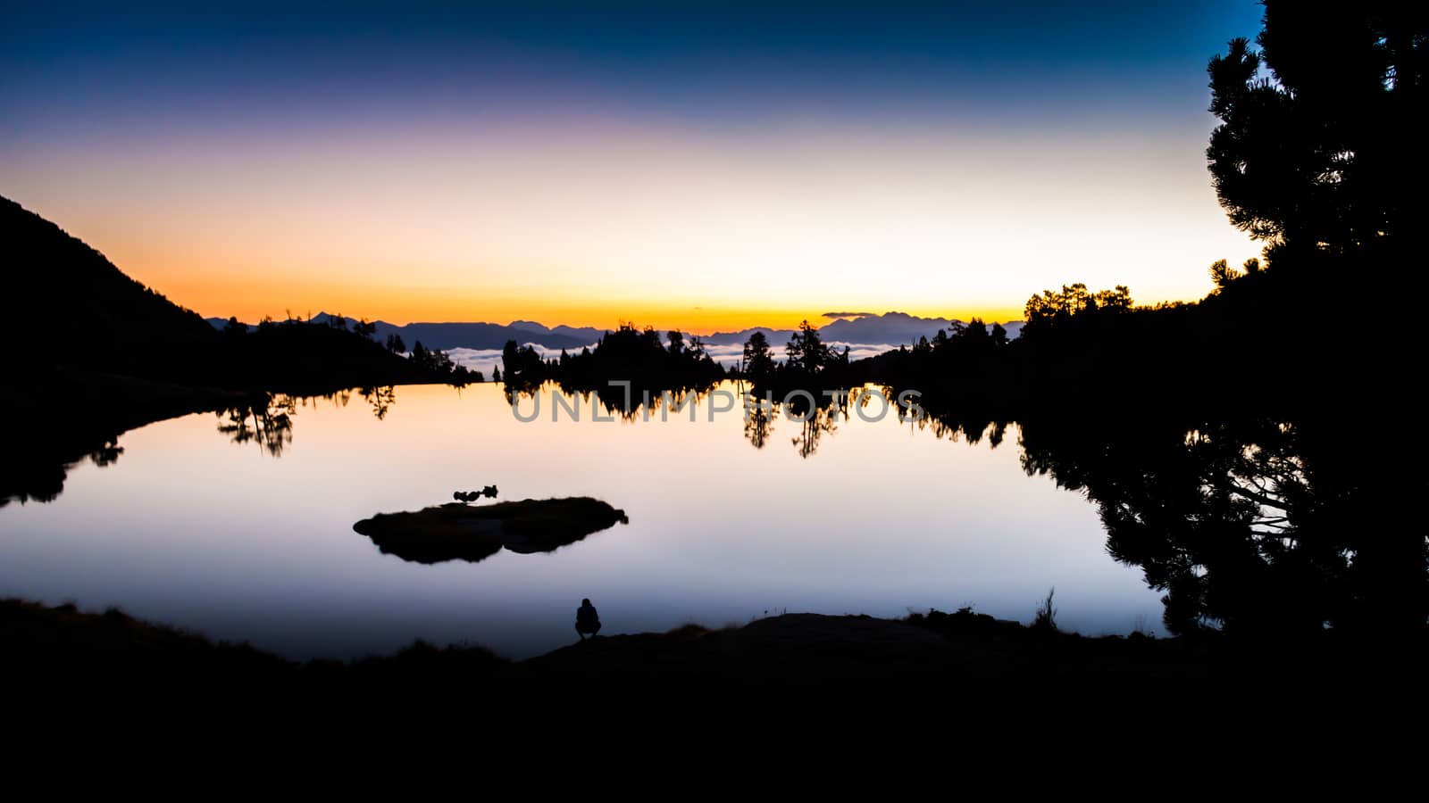 Sunrise lake in the Spanish Pyrenees, located at mountain hut JM Blanc, Aigüestortes i Estany de Sant Maurici national park by kb79