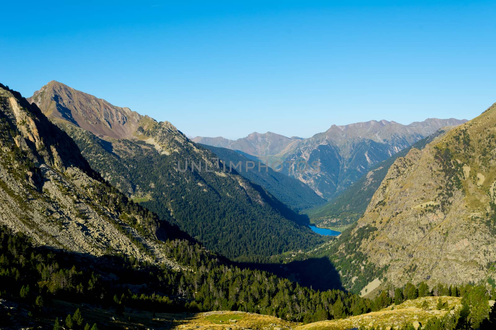 Nature and landscape of the Spanish Pyrenees, Aiguestortes i Estany de Sant Maurici, Carros de Foc hiking trail, with lake in background by kb79