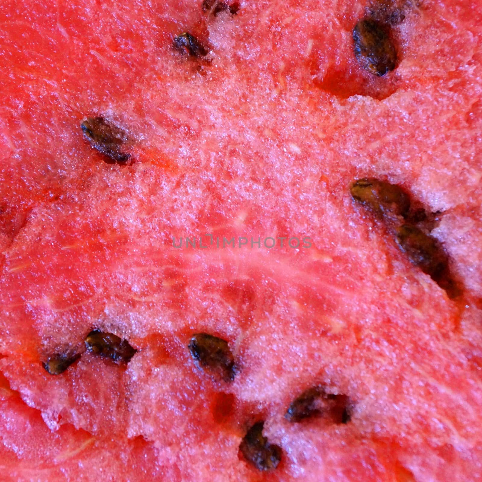 texture of red juicy watermelon for fruit background close up by Annado