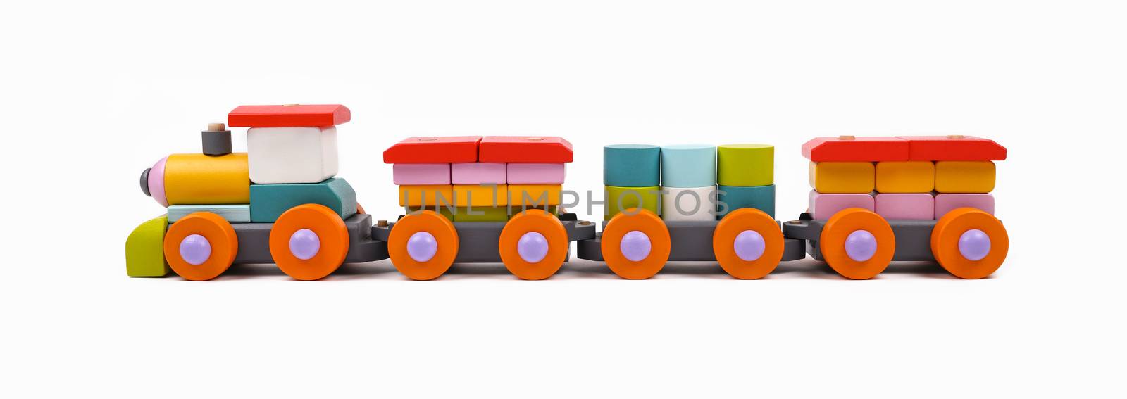Wooden painted toy train isolated on white by BreakingTheWalls