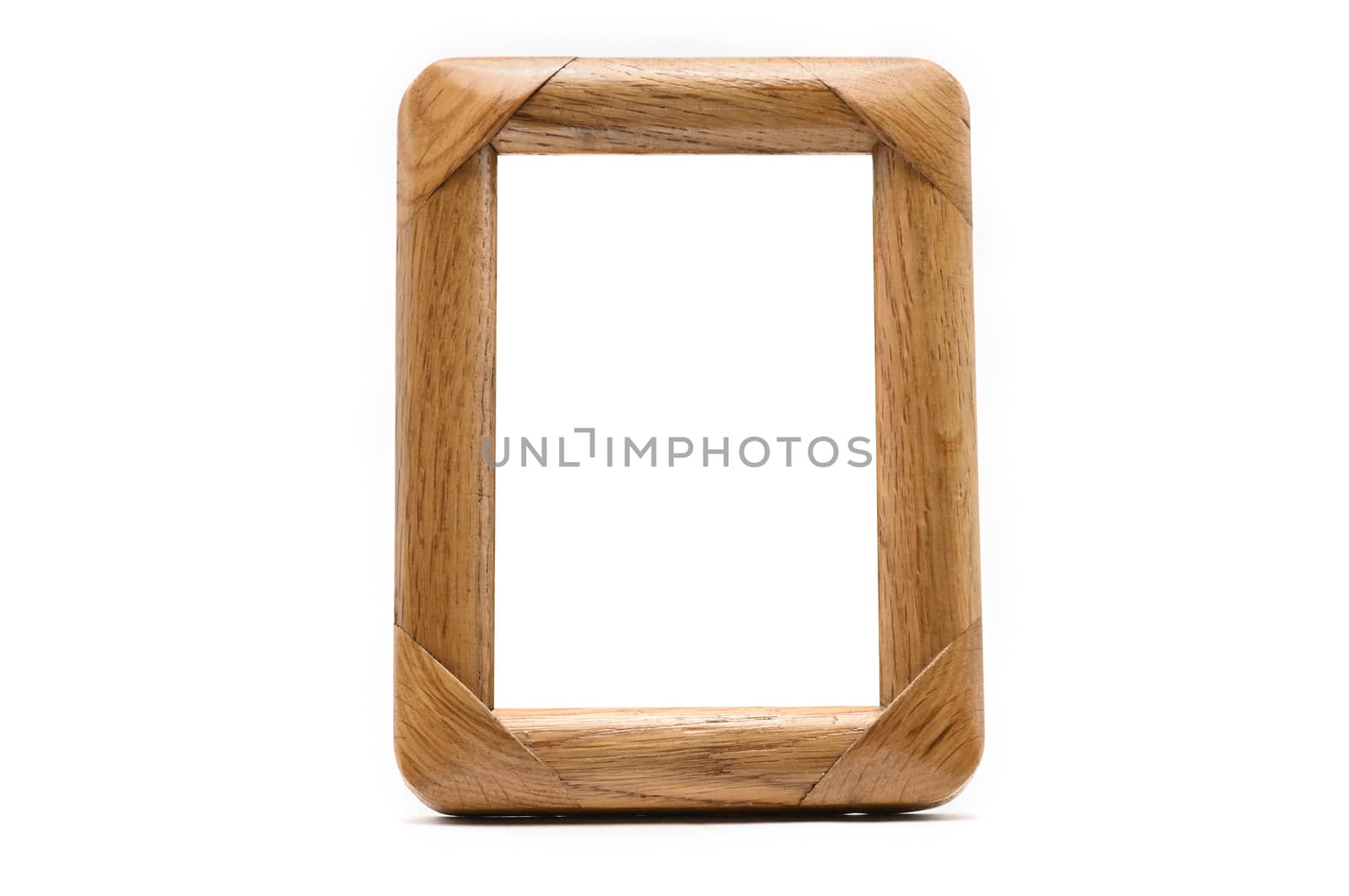 Vintage wooden photo frame on an isolated white background
