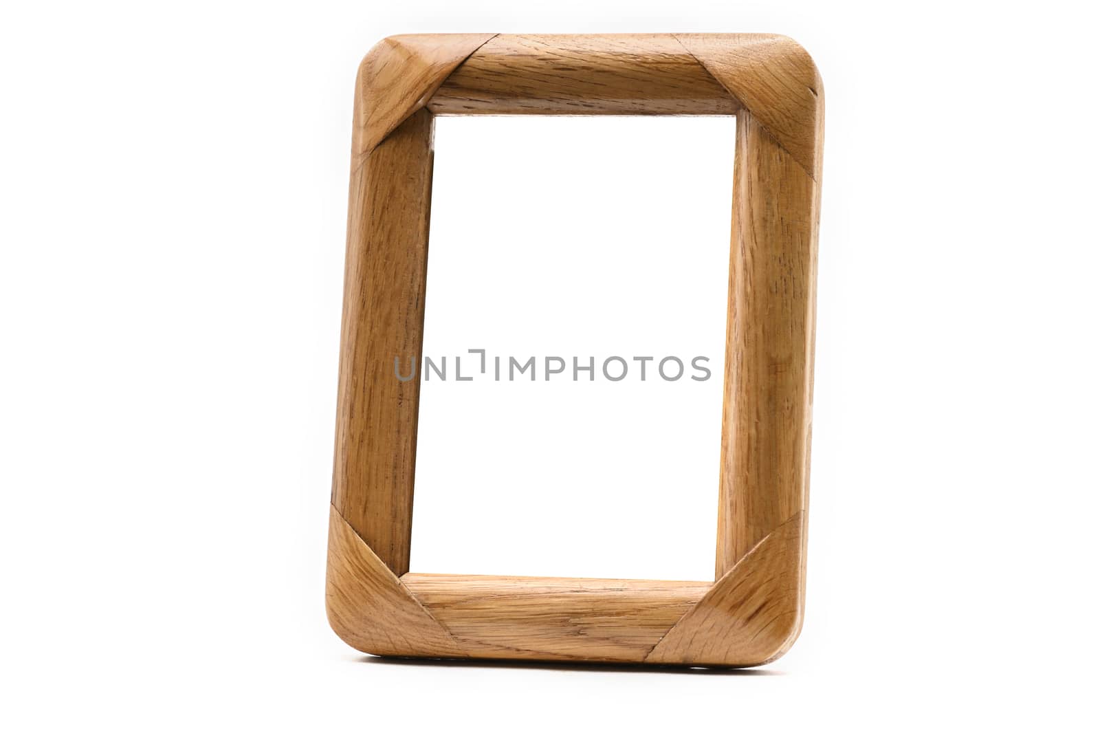 Vintage wooden photo frame on an isolated white background
