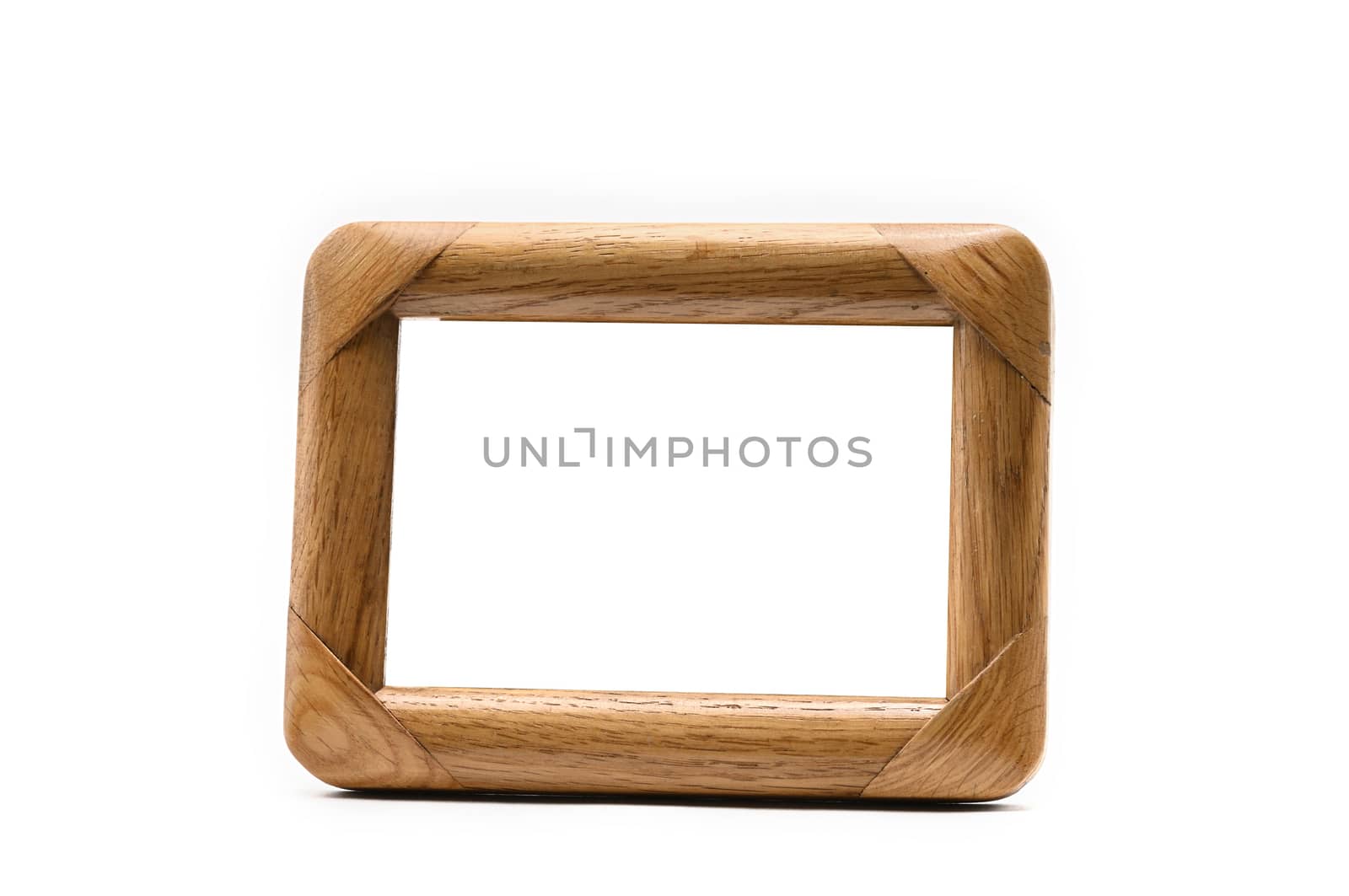 Vintage wooden photo frame on an isolated white background
