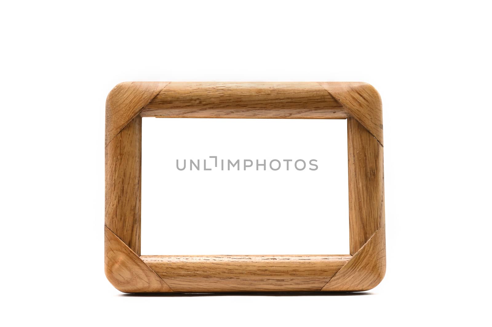 Vintage wooden photo frame on an isolated white background
