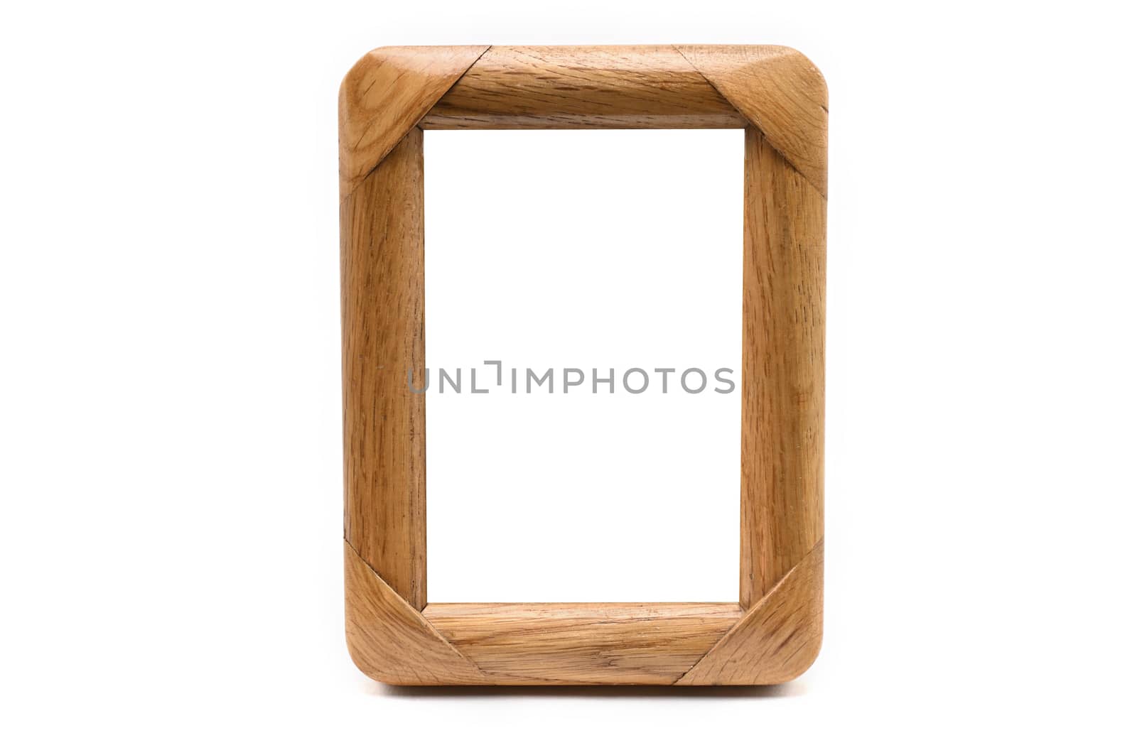Antique wooden photo frame on an isolated white background by moviephoto