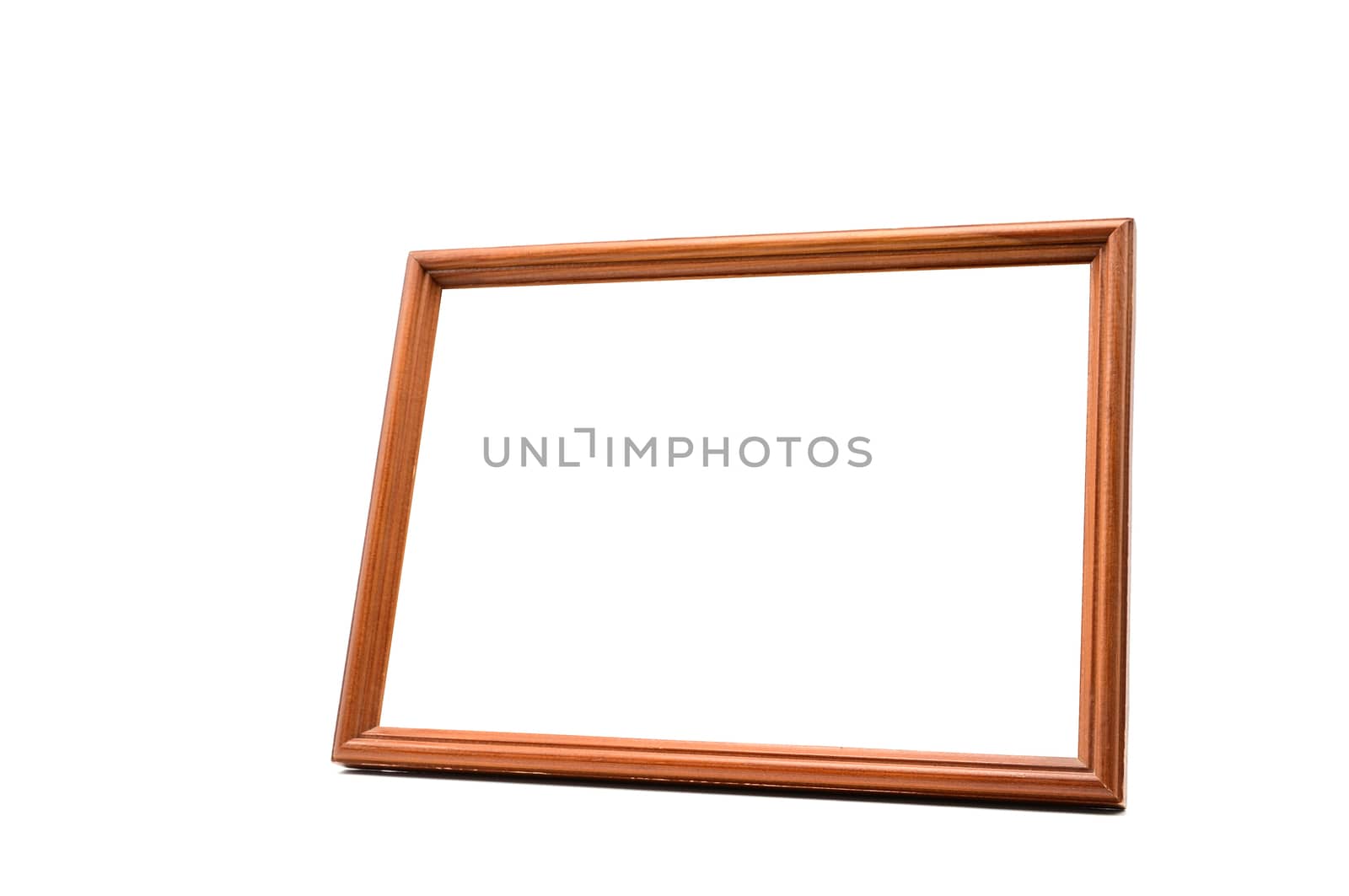 Vintage wooden photo frame on an isolated white background
