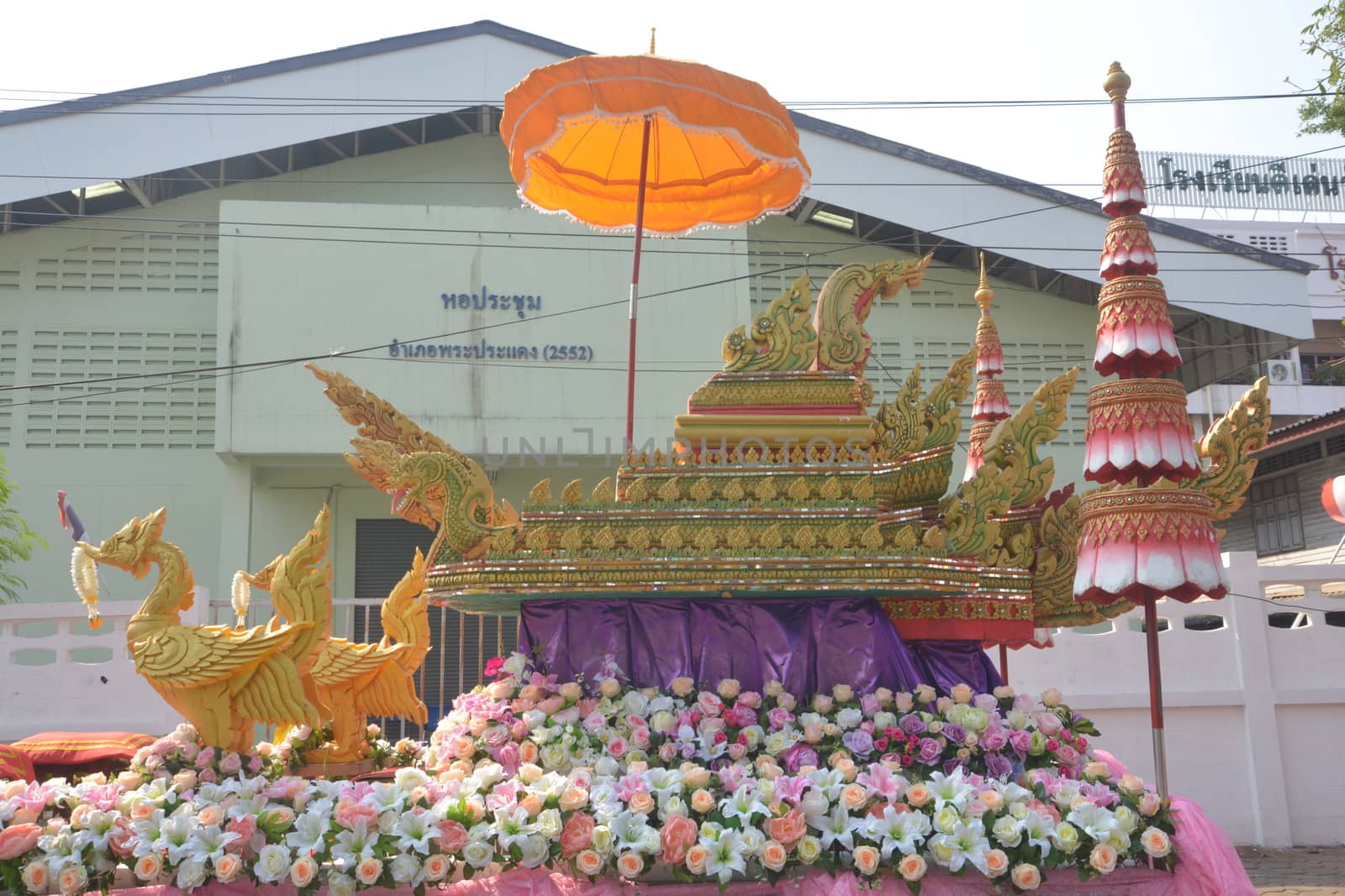 Samut Prakan,Thailand-APRIL 13,2017: Songkran Festival in the Thai-Mon style, featuring a magnificent parade, and see a procession of swan and centipede flags.

