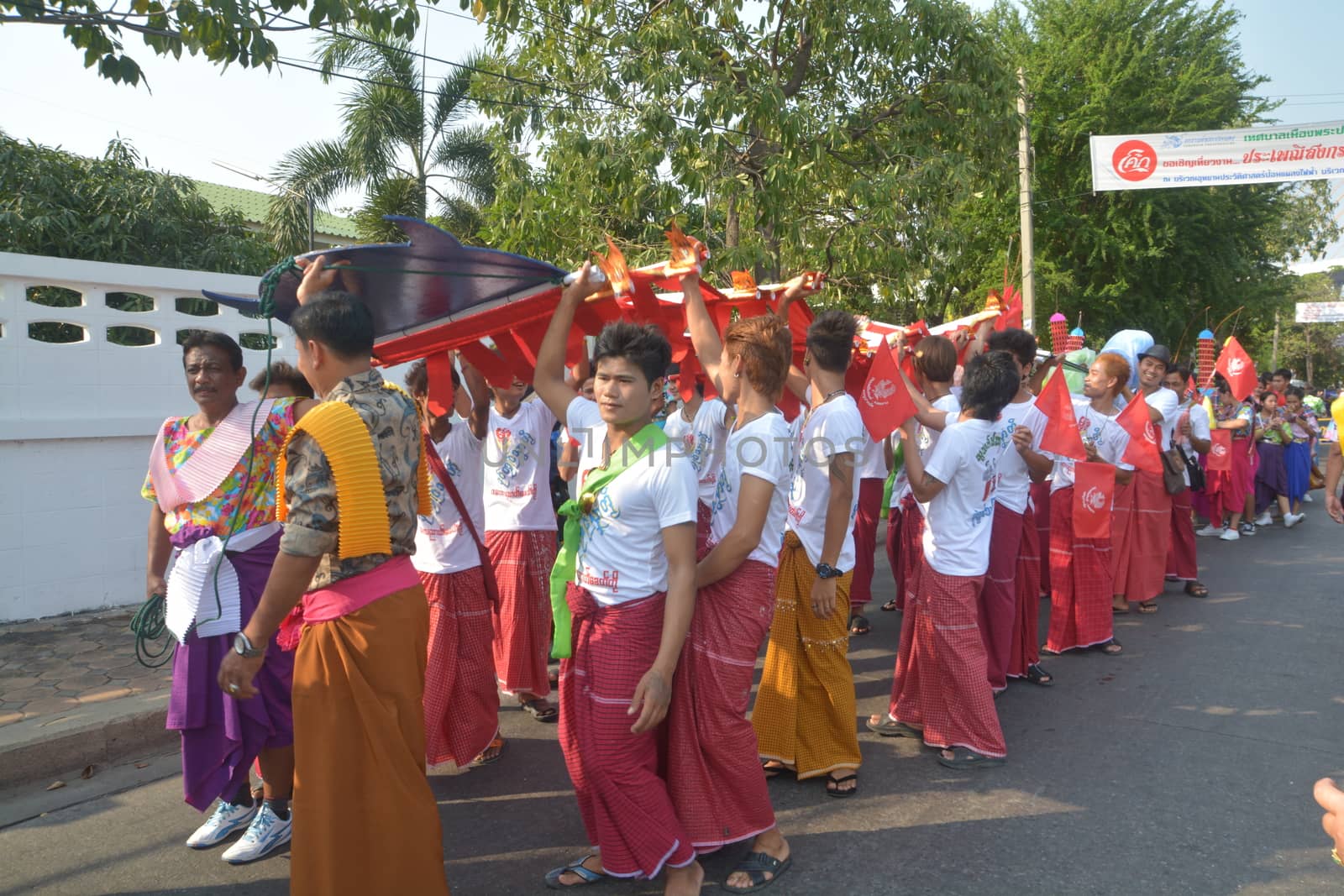 Samut Prakan,Thailand-APRIL 13,2017: Songkran Festival in the Thai-Mon style, featuring a magnificent parade, and see a procession of swan and centipede flags.