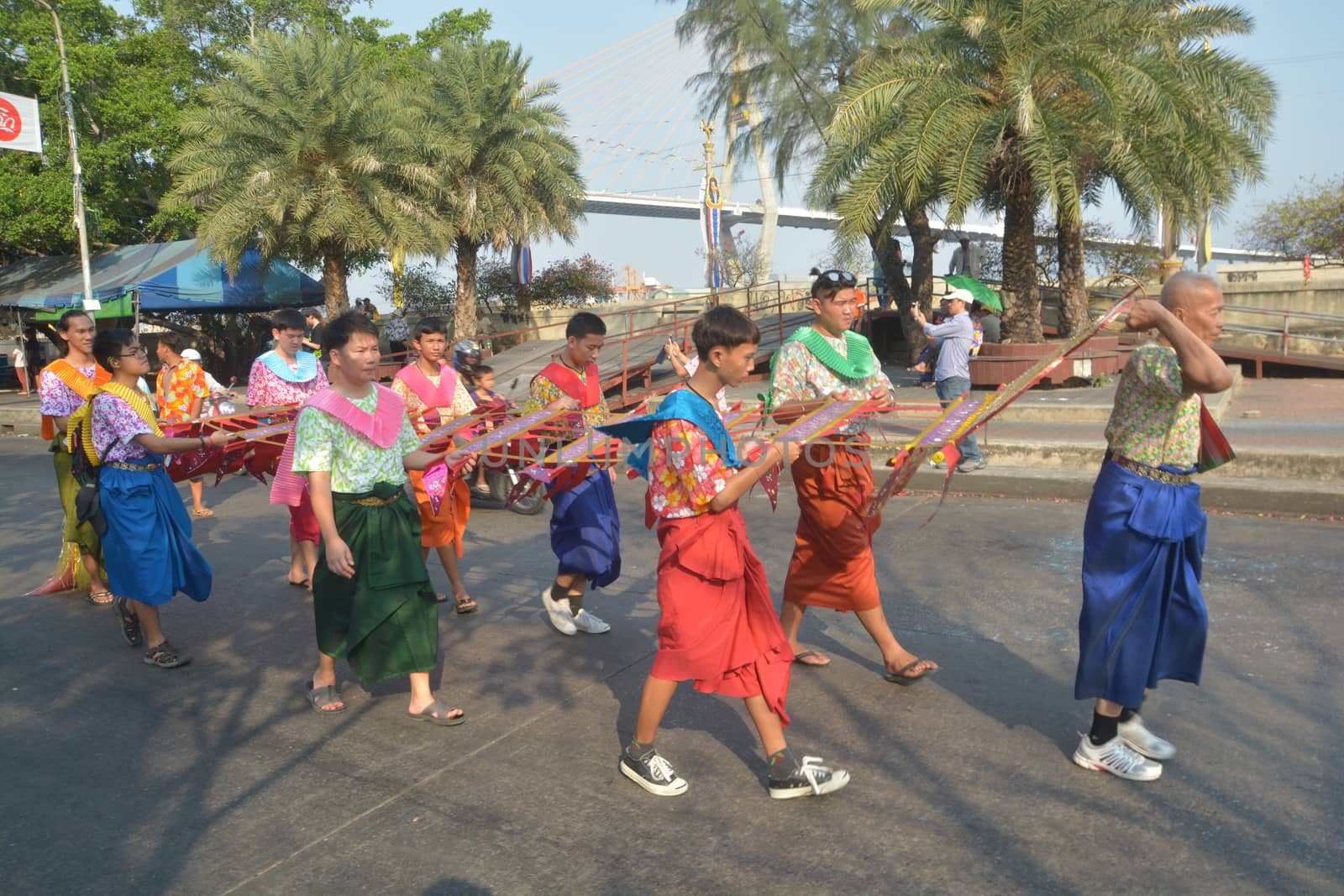 Samut Prakan,Thailand-APRIL 13,2017: Songkran Festival in the Thai-Mon style, featuring a magnificent parade, and see a procession of swan and centipede flags.

