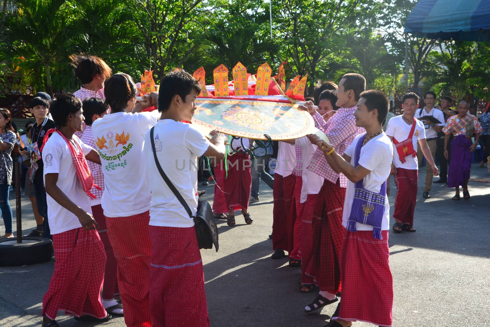 Samut Prakan,Thailand-APRIL 13,2017: Songkran Festival in the Thai-Mon style, featuring a magnificent parade, and see a procession of swan and centipede flags.