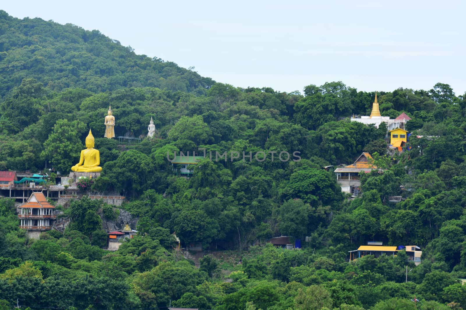 The temple of Wat Tham Yai Prik was first, in 1970, a single house in a limestone cave. Then over the years it has grown while its meditation teacher got famous