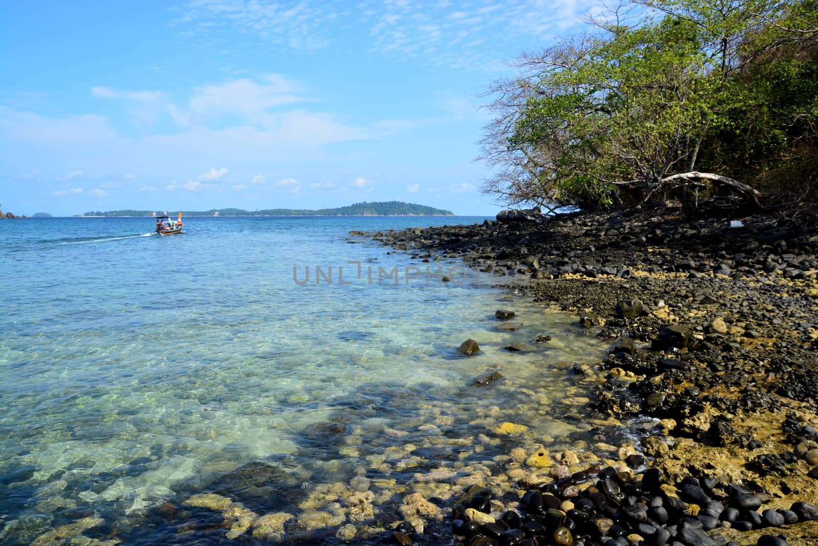 Koh Hin Ngam  is a unique small island unlike other island. It's covered with small black rocks by ideation90