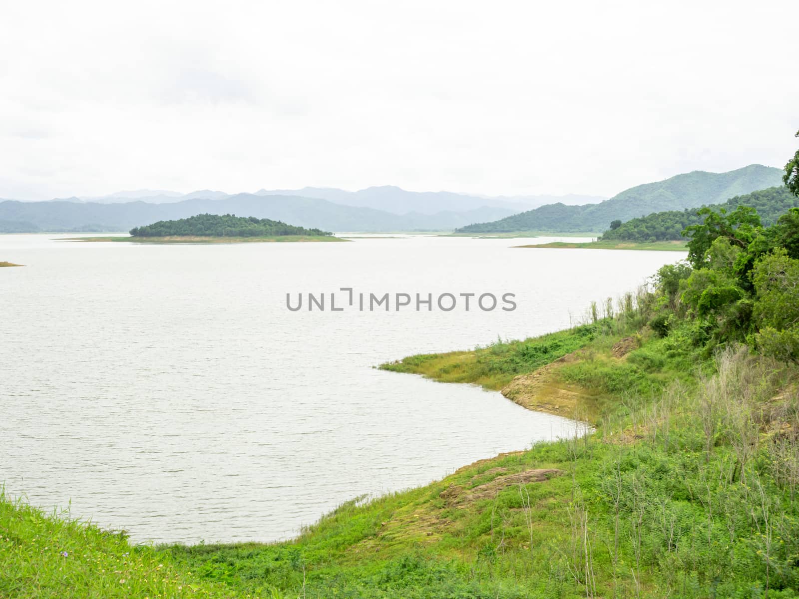 Landscape picture of a reservoir on a dam in Thailand by Unimages2527