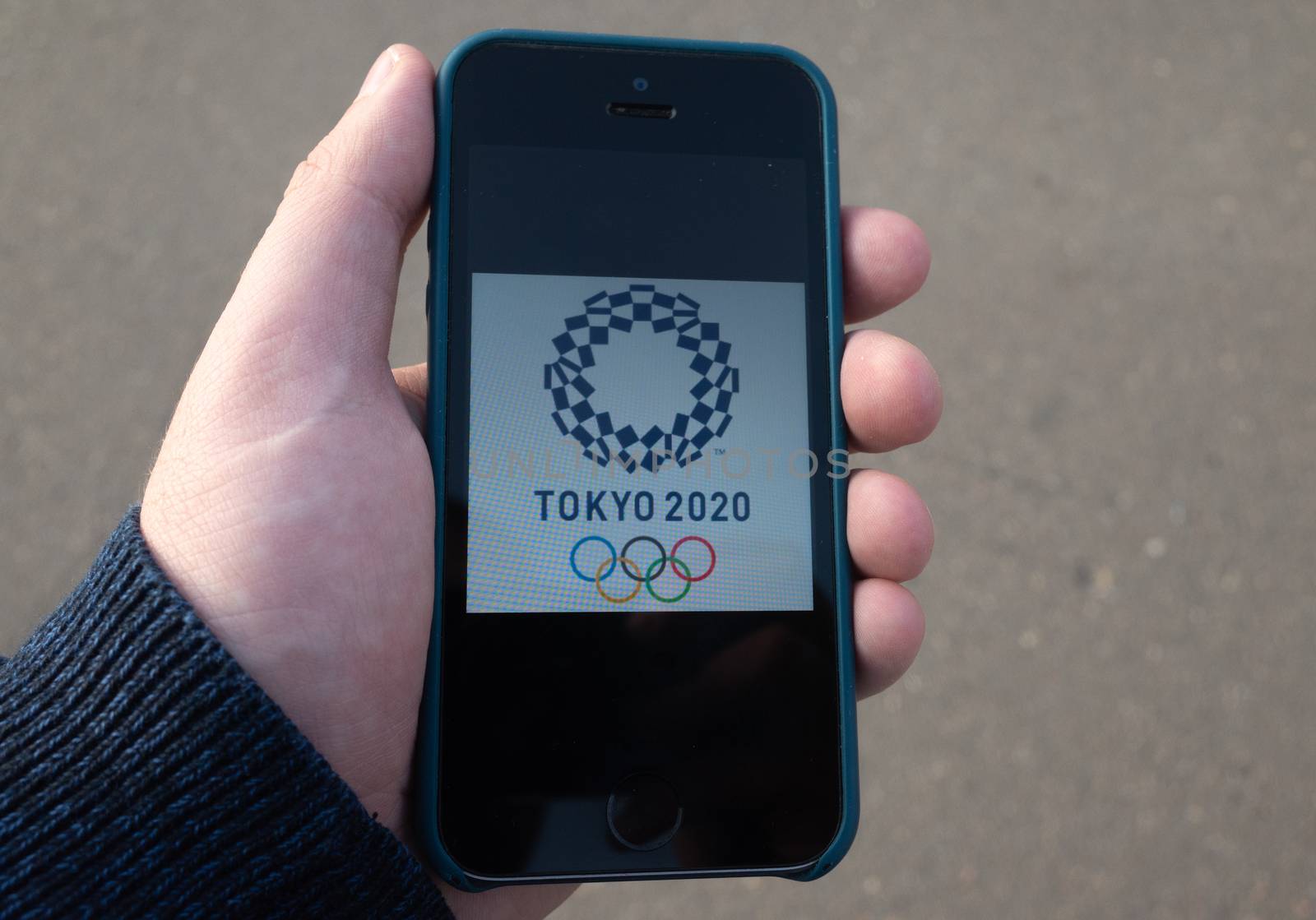 October 22, 2019. Tokyo, Japan. Logo of the XXXII  Summer Olympics games 2020 on a mobile phone screen.