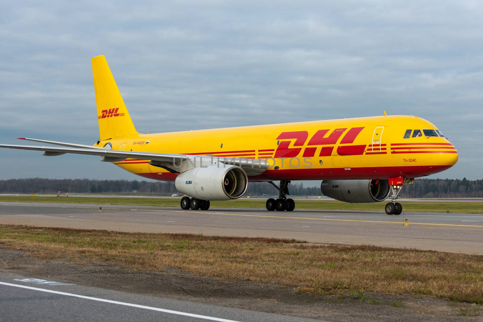 October 29, 2019, Moscow, Russia. Plane 
Tupolev Tu-204 Aviastar Airlines in livery DHL at Sheremetyevo airport in Moscow.